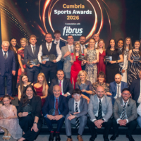 Winners of the 2026 Cumbria Sports Awards standing in a group holding trophies