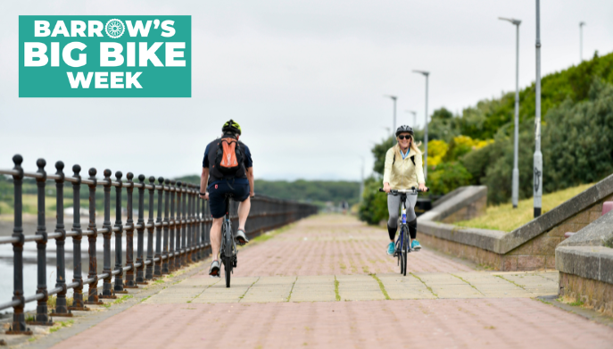two people cycling along the channelside in Barrow.  White text on a green background reads Barrow's Big Bike Week