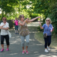 3 ladies dancing outdoors text over the image reads Move Your Way
