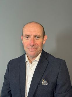 headshot of Neil Cooper