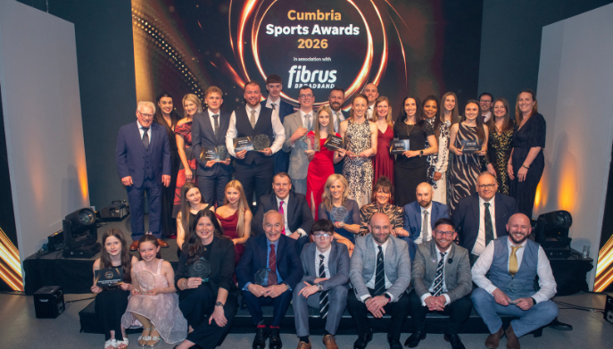 Winners of the 2026 Cumbria Sports Awards standing in a group holding trophies