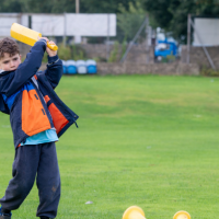a boy playing cricket